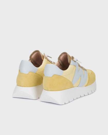 Yellow sneakers for comfortable everyday wear.