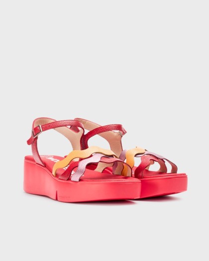  a lightweight platform sole and ankle strap.