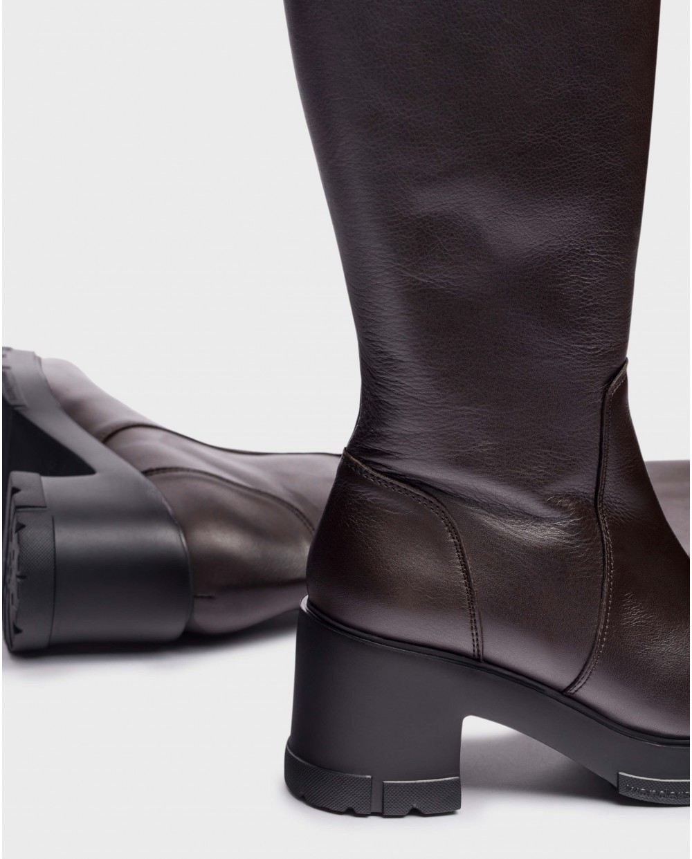 Black leather boot with track sole