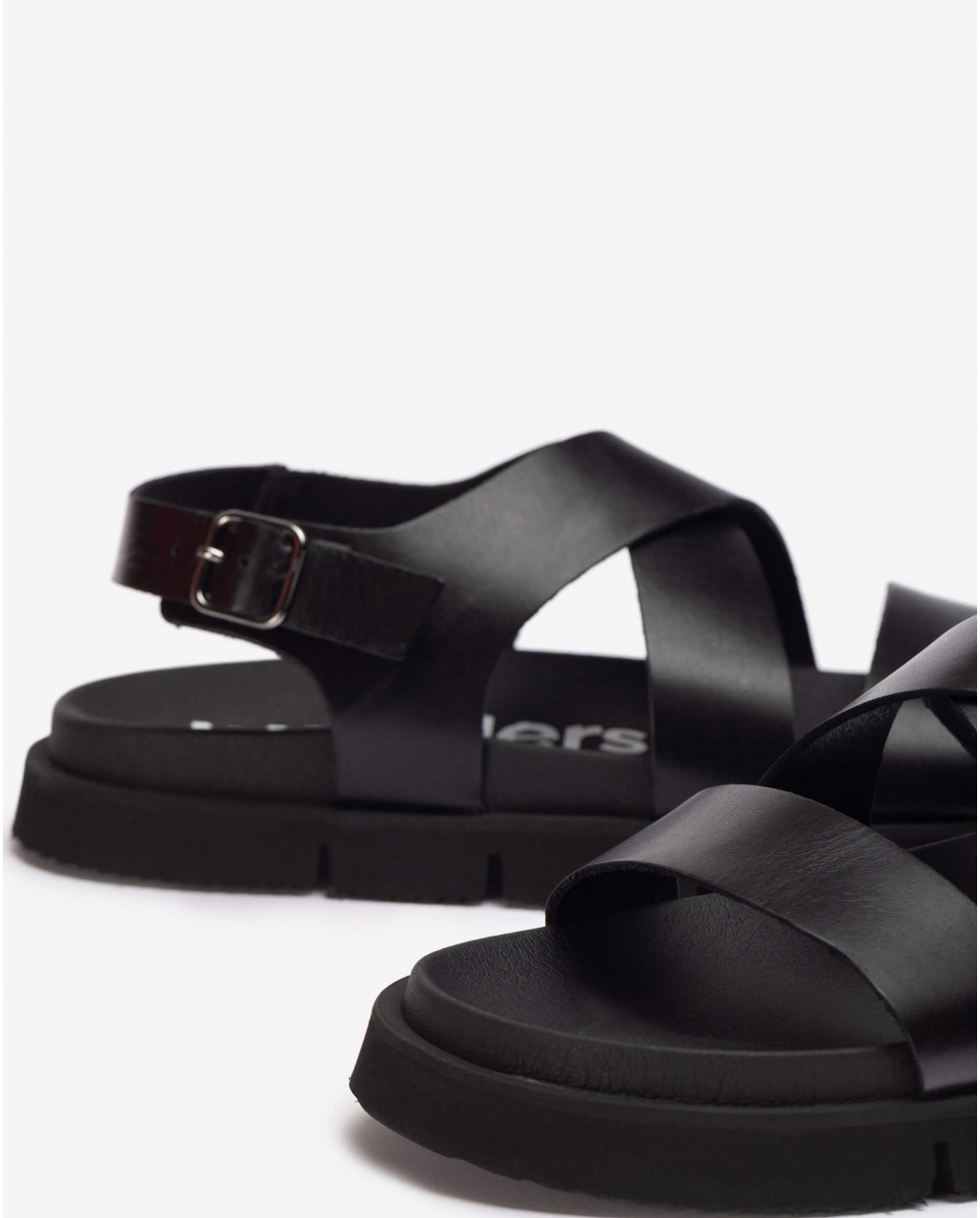 Leather sandal with cross over straps